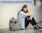 Teenage girl sitting on school hallway next to a grey backpack with head help in hand, suffering from social anxiety.